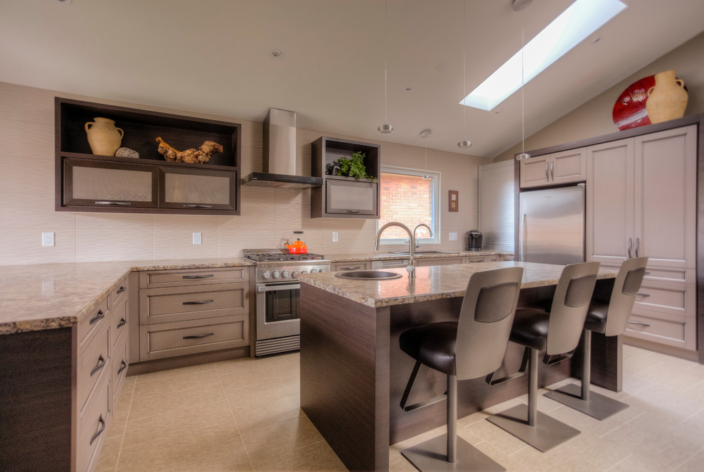Example of a transitional kitchen design in Toronto