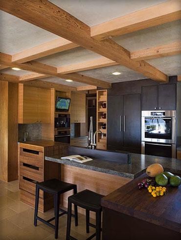Inspiration for a large contemporary u-shaped eat-in kitchen in San Francisco with flat-panel cabinets, light wood cabinets, granite benchtops, stainless steel appliances, limestone floors, multiple islands, an undermount sink, multi-coloured splashback and stone slab splashback.