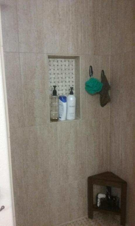 Inspiration for a mid-sized transitional master beige tile and porcelain tile mosaic tile floor home design remodel