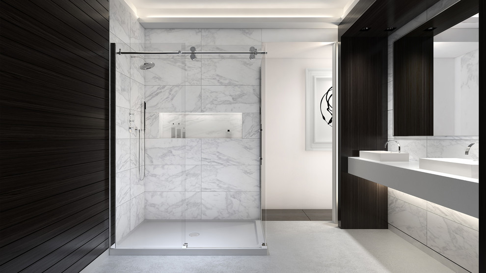 This is an example of a mid-sized modern master bathroom in London with a pedestal sink, limestone benchtops, a corner shower, white tile, stone slab, white walls and travertine floors.
