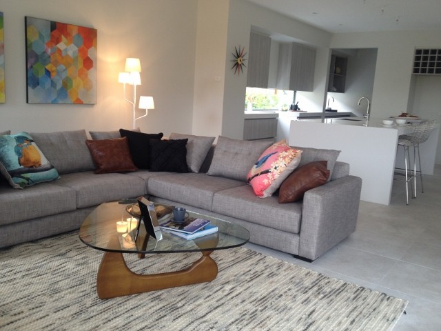 This is an example of a large modern family room in Geelong.