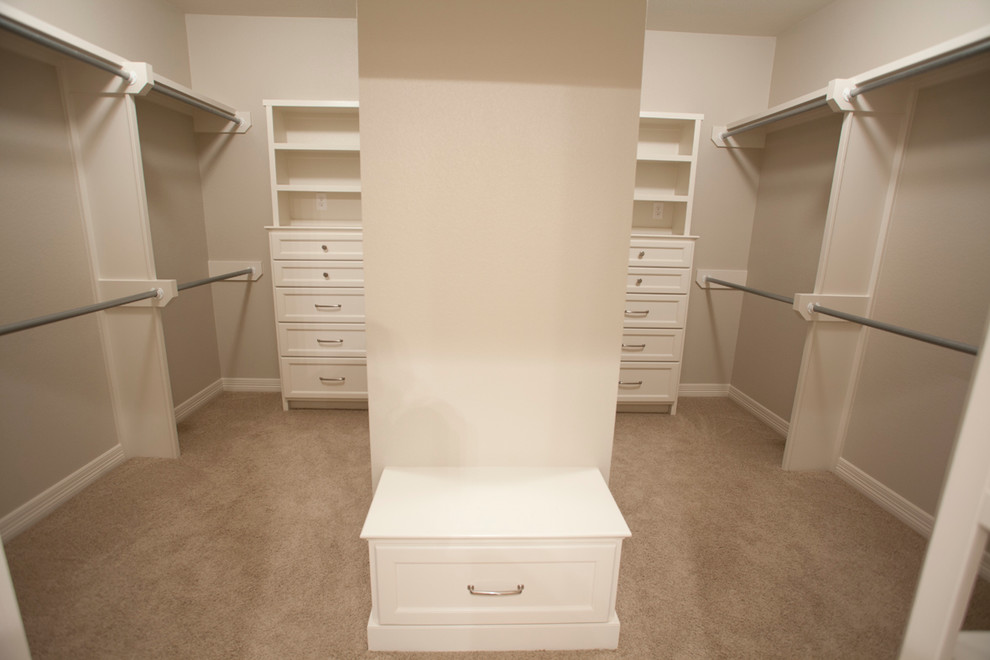 Inspiration for a large country gender-neutral walk-in wardrobe in Austin with shaker cabinets, white cabinets and carpet.