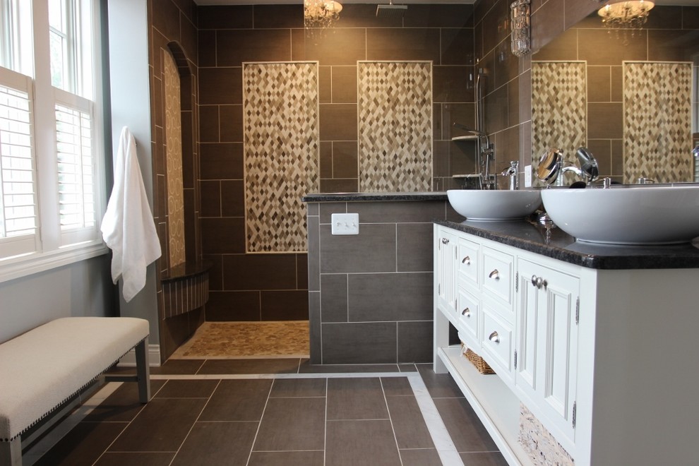 Design ideas for a mid-sized traditional master bathroom in Detroit with furniture-like cabinets, white cabinets, an open shower, a wall-mount toilet, gray tile, cement tile, blue walls, ceramic floors, a vessel sink, granite benchtops and grey floor.