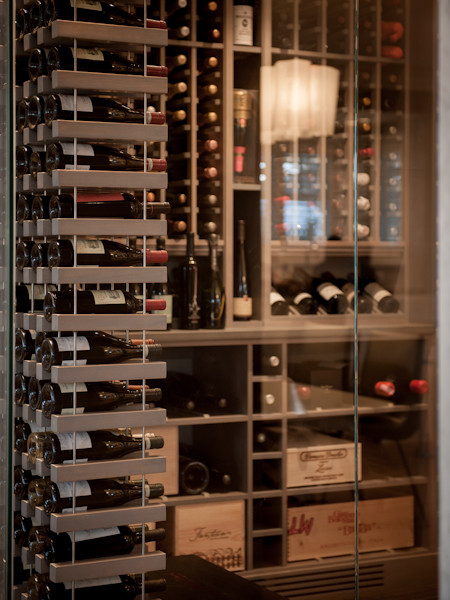 Inspiration for a large transitional wine cellar remodel in Orlando with storage racks