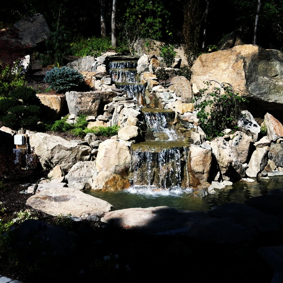 before and after landscape waterfall pond and paver patio