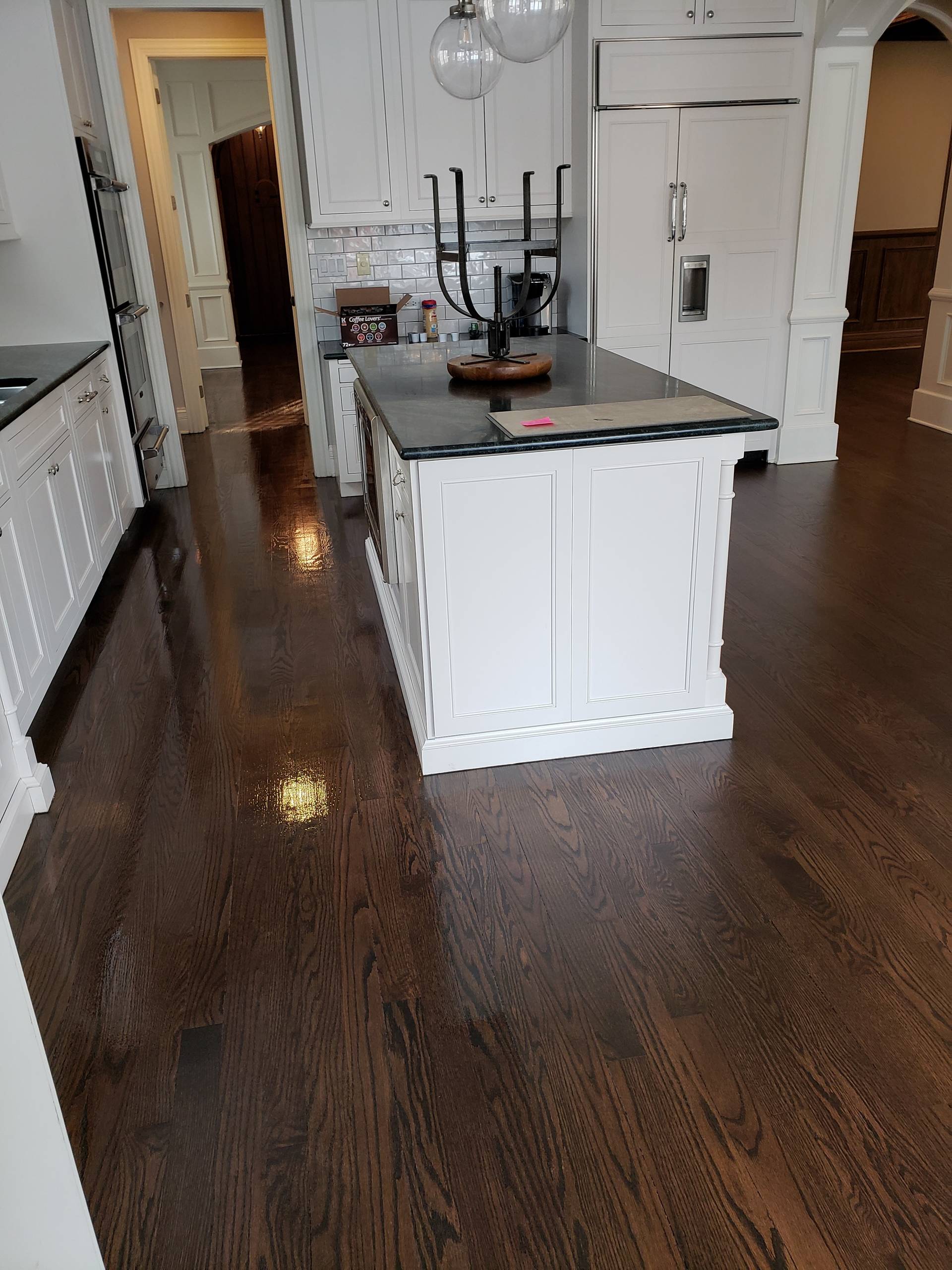 2 and 1/4 red oak select and better , Jacobean stain and 3 coats of Bona finish