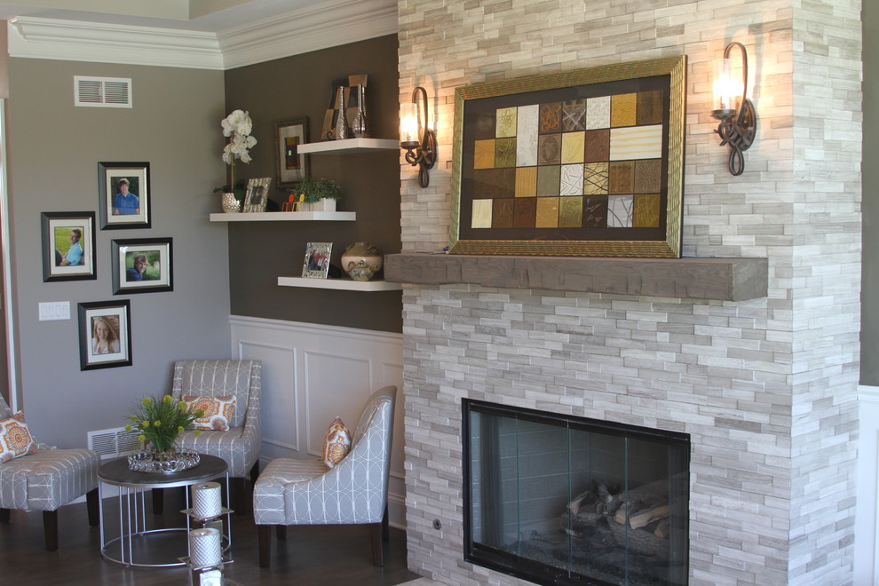 Inspiration for a mid-sized transitional formal open concept living room in Milwaukee with grey walls, dark hardwood floors, no fireplace, a stone fireplace surround, no tv and brown floor.