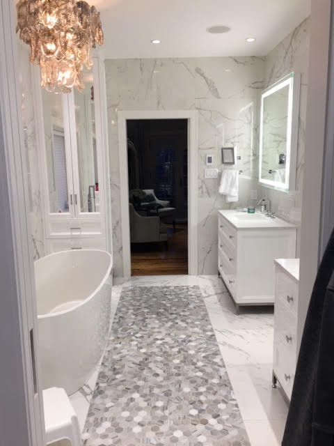 Spaciously Renovated Bathroom And Custom Closet