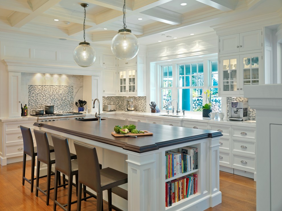 Traditional kitchen in Boston with recessed-panel cabinets, white cabinets and multi-coloured splashback.
