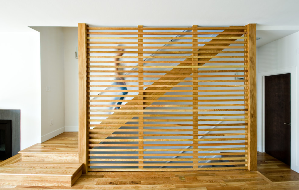 Inspiration for a contemporary wood straight staircase in Denver.