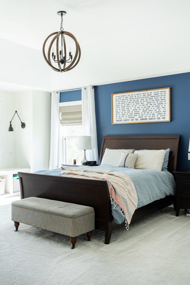 Design ideas for a large classic master bedroom in Chicago with blue walls, carpet, no fireplace, beige floors and a vaulted ceiling.