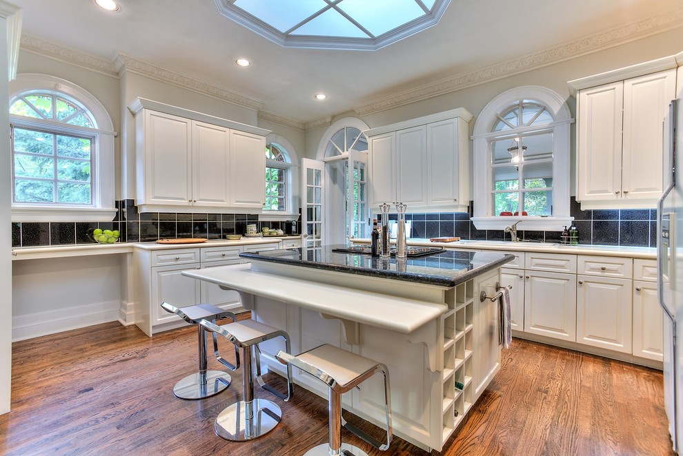 Example of a transitional kitchen design in Toronto