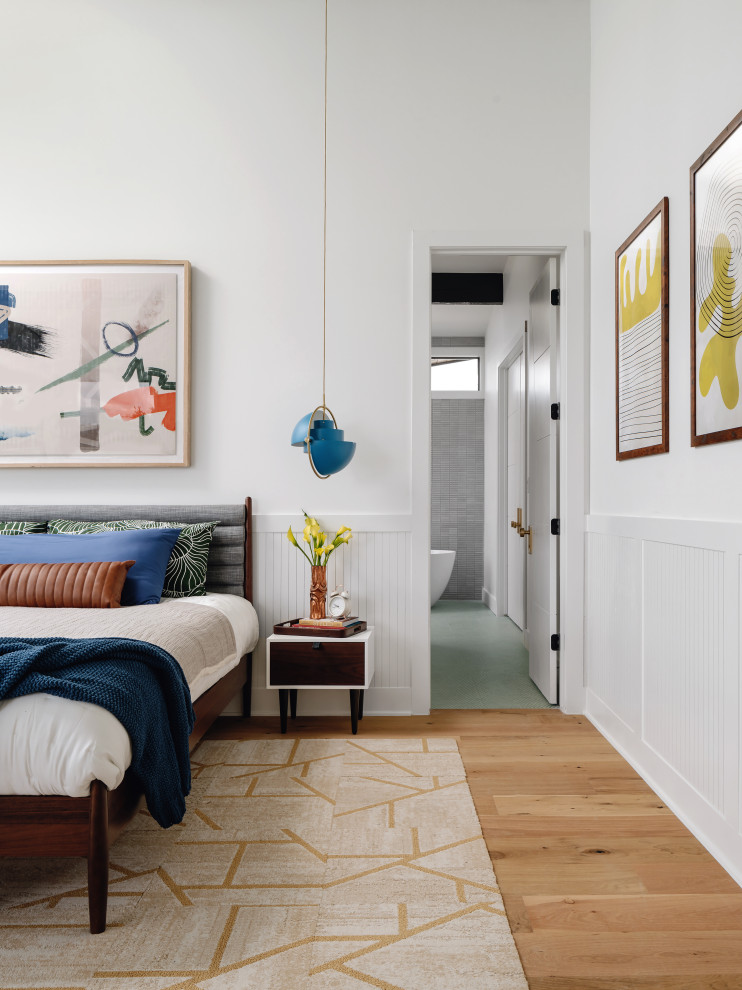 Bedroom - mid-sized 1960s master medium tone wood floor and beige floor bedroom idea in San Francisco with white walls