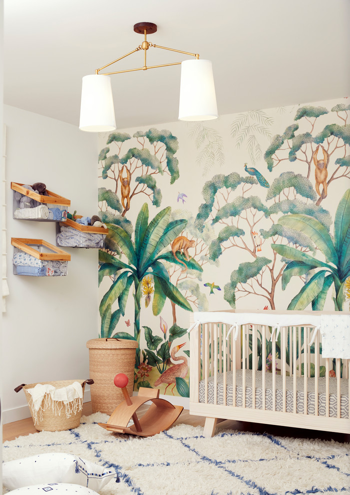 Venice Beach Spanish Contemporary - Inspiration for a contemporary gender-neutral medium tone wood floor and brown floor nursery remodel in Los Angeles with white walls
