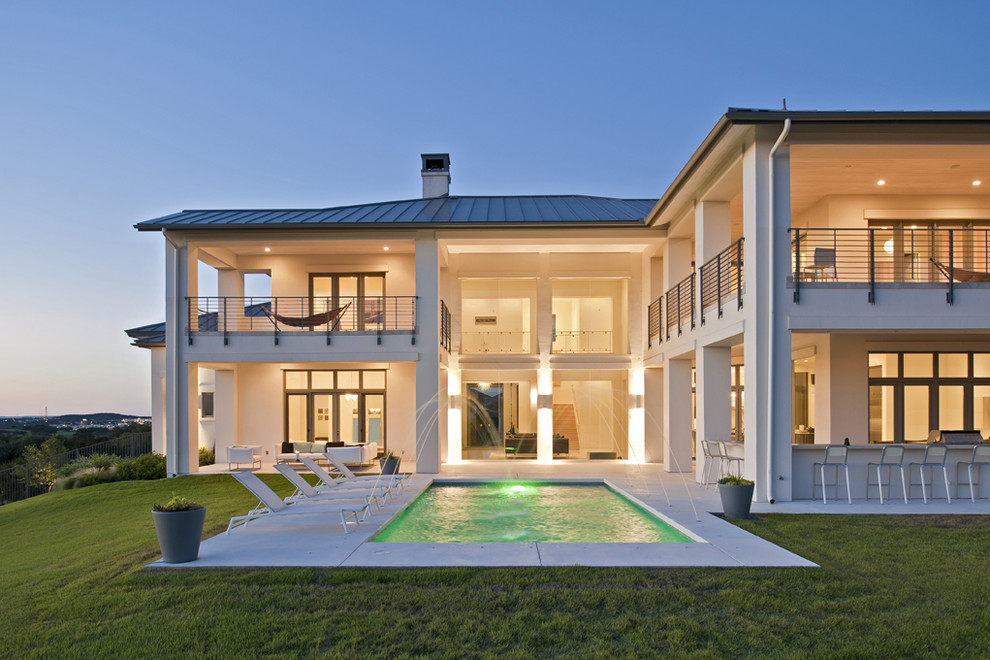 This is an example of a contemporary rectangular pool in Austin.