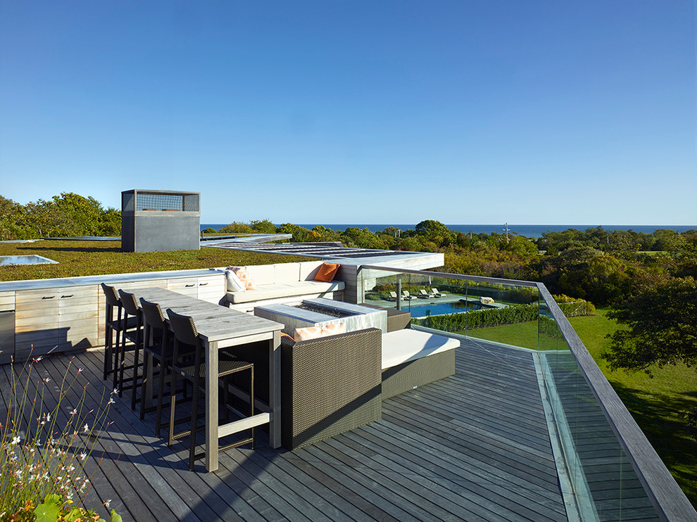 This is an example of a large contemporary rooftop and rooftop deck in Boston with no cover.
