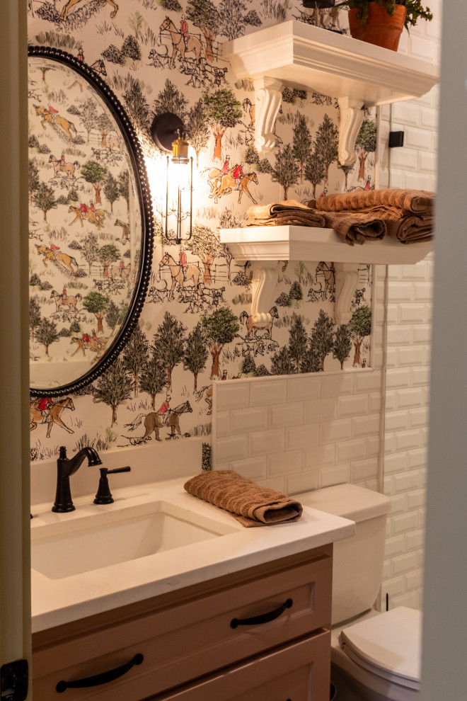 Bathroom with equine themed wallpaper