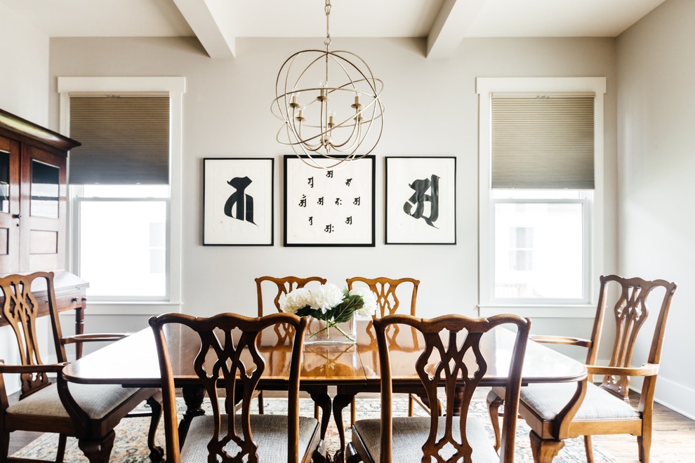 Inspiration for a transitional separate dining room in Nashville with beige walls, medium hardwood floors and brown floor.