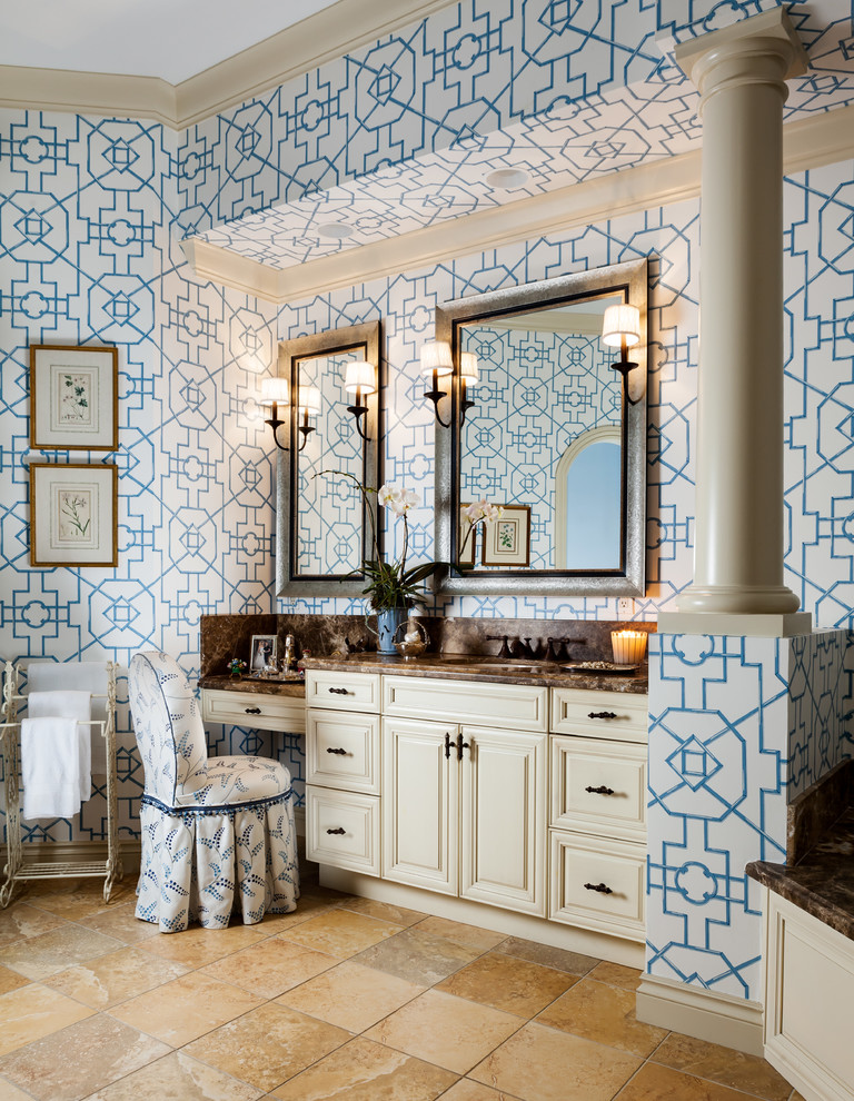 This is an example of a large traditional master bathroom in Miami with blue walls, beige cabinets, raised-panel cabinets, porcelain floors, an undermount sink, granite benchtops and brown floor.