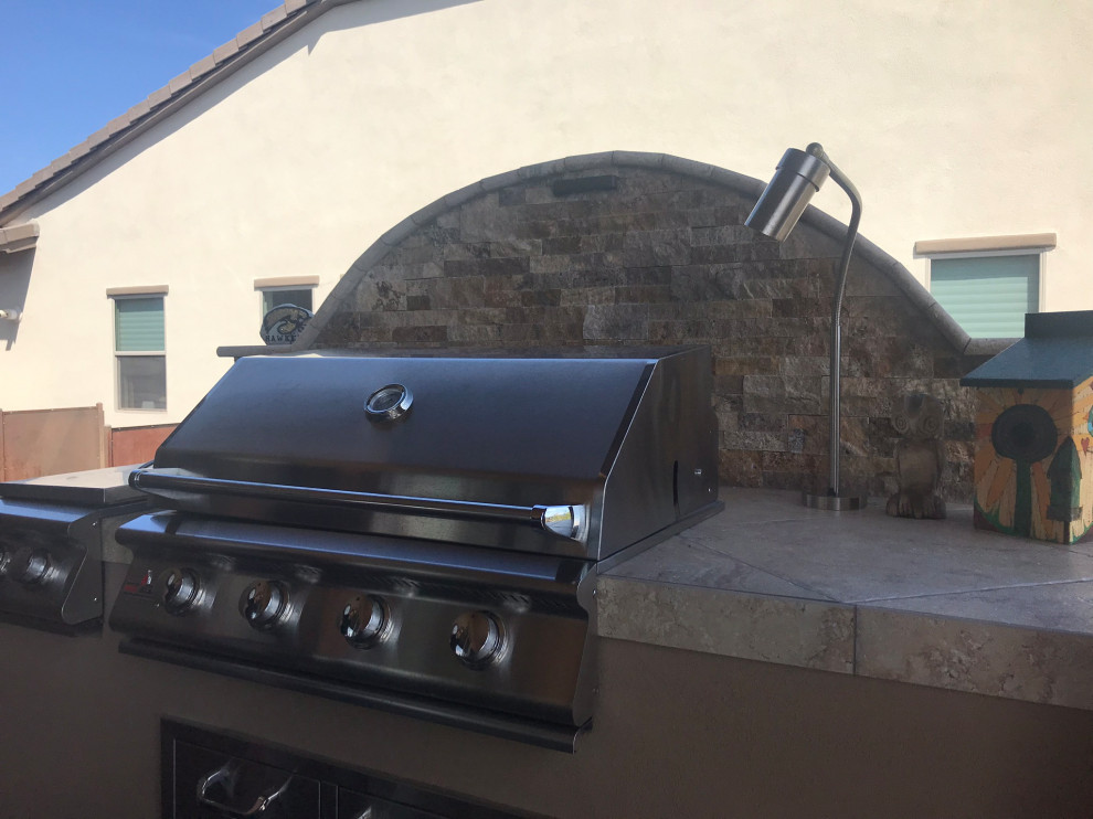 Inspiration for a mid-sized transitional home design remodel in Phoenix