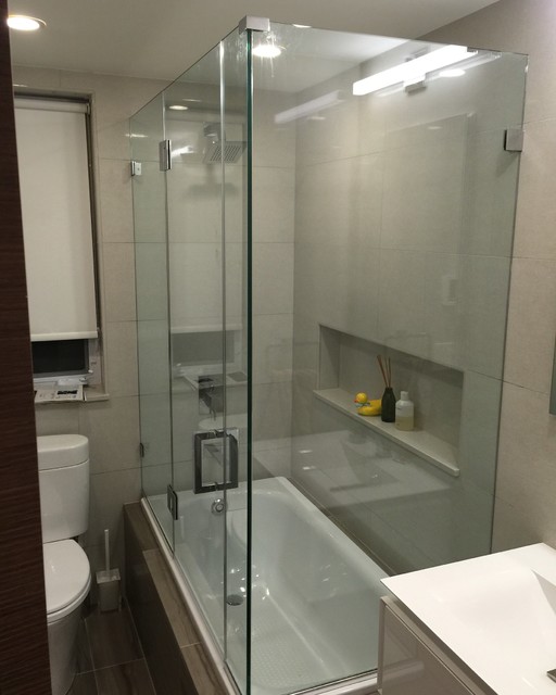 Custom corner tub shower enclosure Modern Bathroom New York by