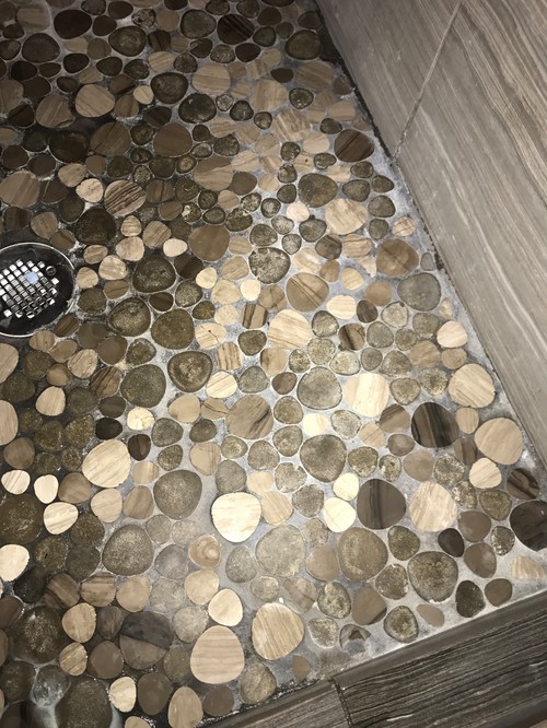 Cleaning pebble rock shower basin advise?