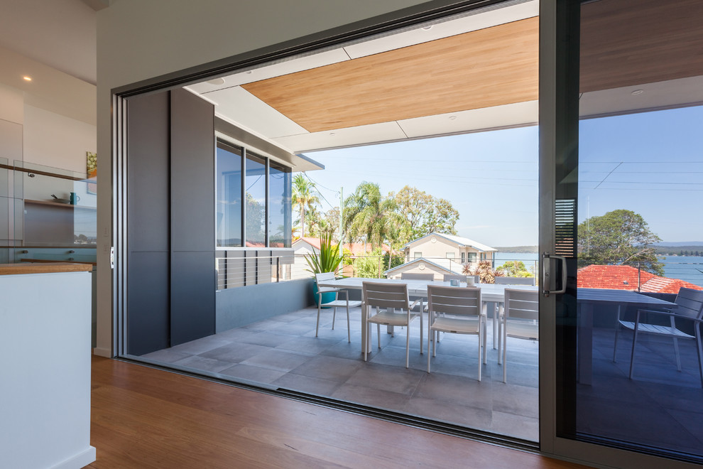Photo of a contemporary patio in Newcastle - Maitland.