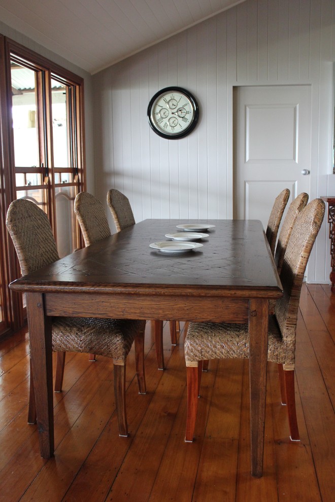 Queenslander Dining Room with Table by Charcoal Interiors Traditional Dining Room