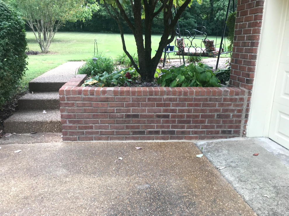 Brick Retaining Wall Restoration from Previous Failed Mortar Matching Repairs