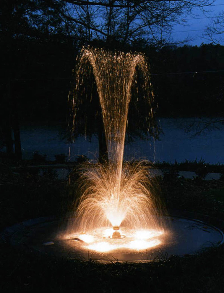 Backyard concrete paver pool fountain photo