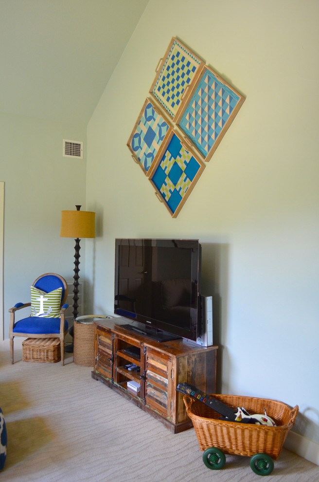 Large beach style kids' playroom in Dallas with grey walls and carpet for kids 4-10 years old and boys.