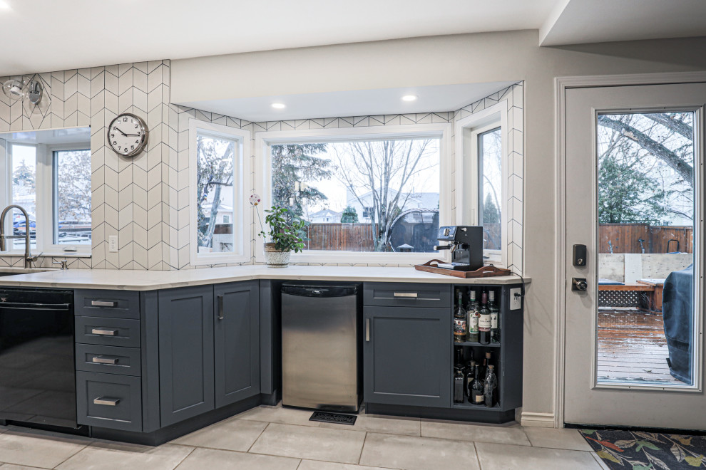 Transitional home design photo in Edmonton