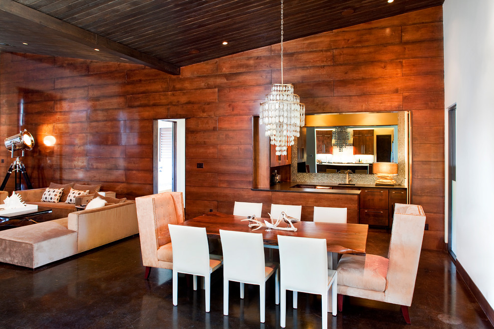 Contemporary open plan dining in Austin with white walls.