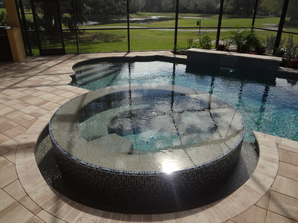 Mid-sized pool photo in Miami
