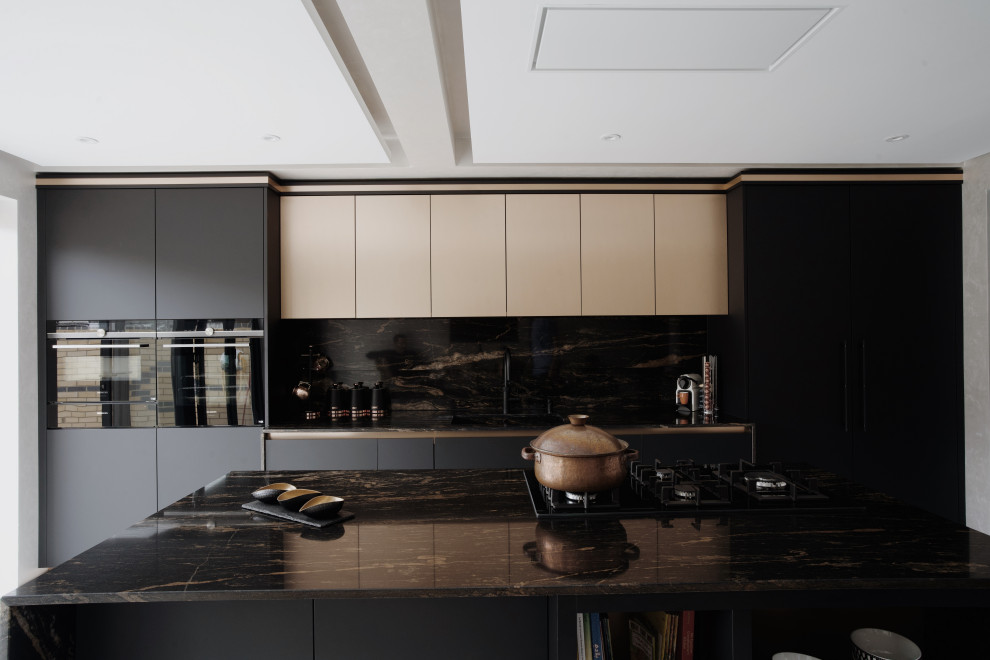 Photo of a medium sized contemporary single-wall kitchen/diner in London with a submerged sink, flat-panel cabinets, black cabinets, granite worktops, black splashback, black appliances, porcelain flooring, an island, white floors and black worktops.