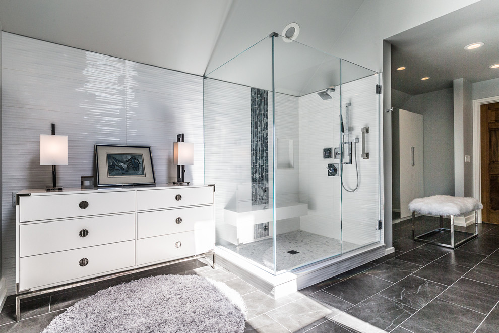 Inspiration for a mid-sized modern master bathroom in Chicago with flat-panel cabinets, grey cabinets, a corner shower, a two-piece toilet, white tile, porcelain tile, grey walls, porcelain floors, an undermount sink, engineered quartz benchtops, grey floor and a hinged shower door.