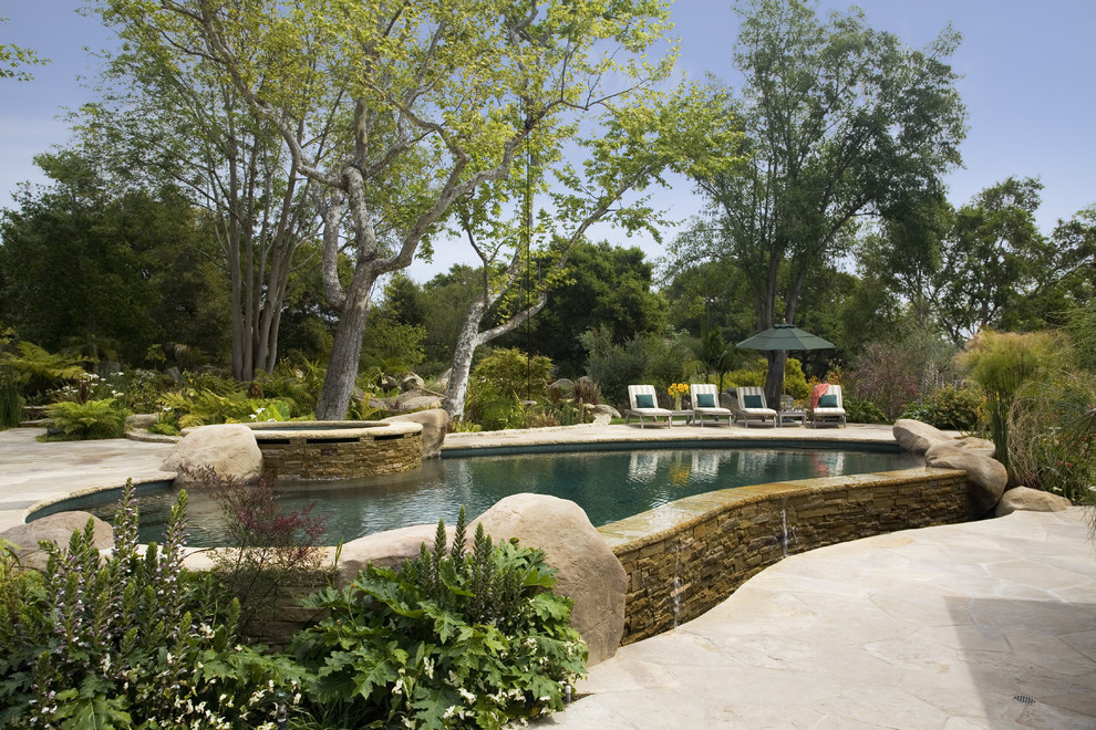 This is an example of a traditional pool in Santa Barbara with natural stone pavers.
