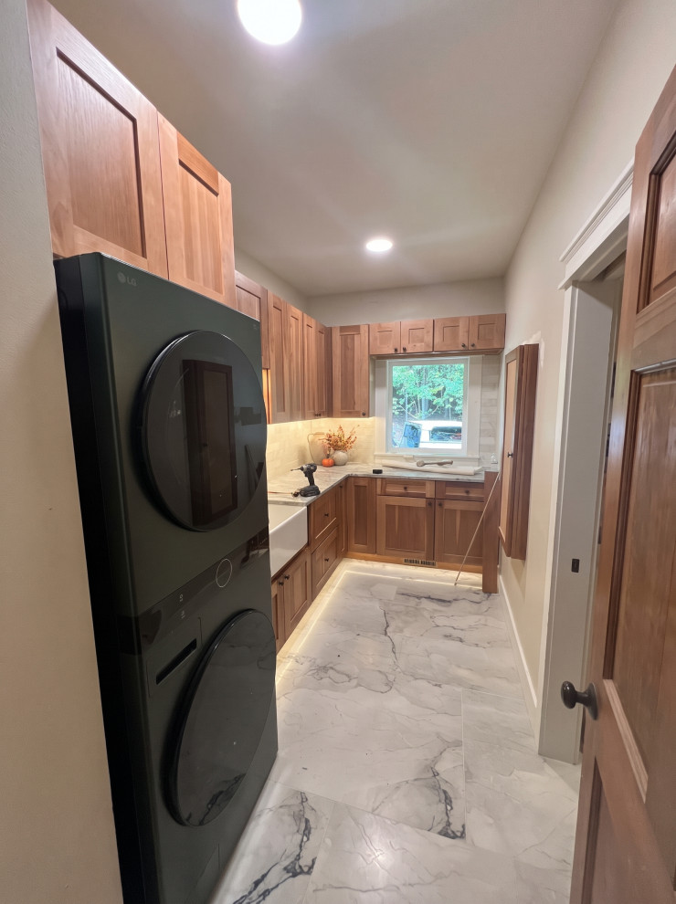 French Chalet Laundry Room with Natural Wood Cabinetry
