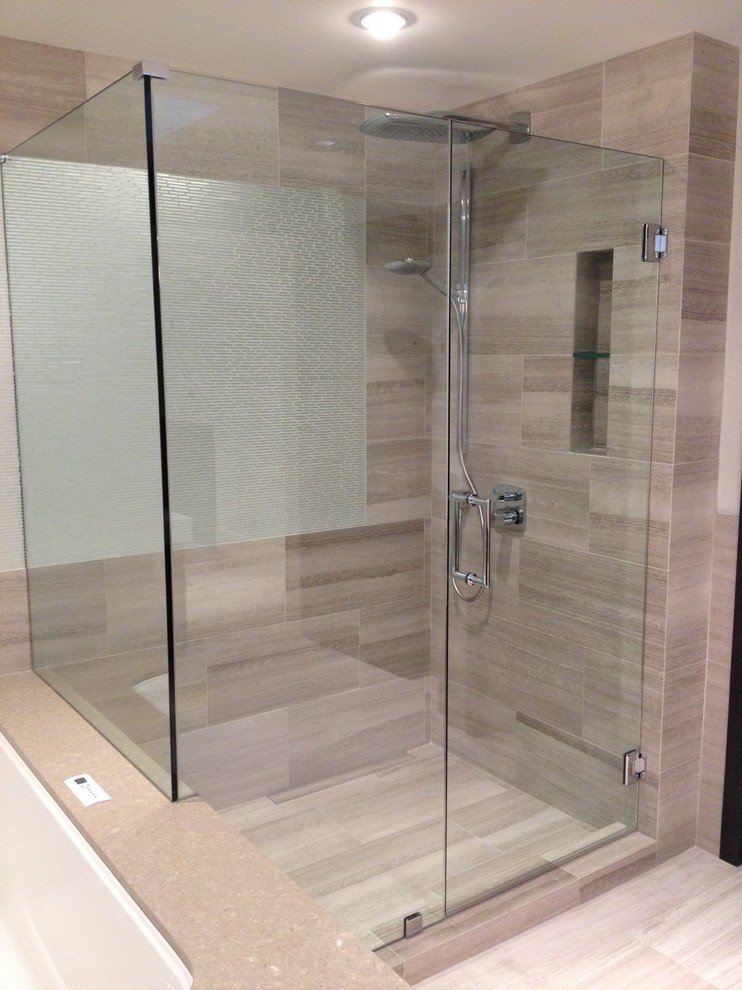 Inspiration for a small contemporary master bathroom in Vancouver with an undermount sink, flat-panel cabinets, dark wood cabinets, granite benchtops, an undermount tub, an alcove shower, beige tile, ceramic tile, white walls and light hardwood floors.