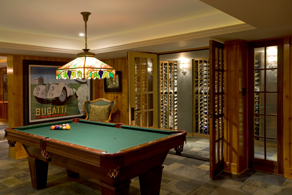 Inspiration for a transitional ceramic tile basement remodel in Chicago with brown walls and a standard fireplace