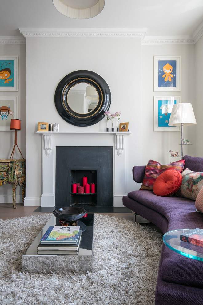 Design ideas for a contemporary living room in London with grey walls and a standard fireplace.