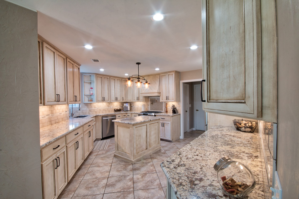 Example of a large l-shaped cement tile floor and beige floor kitchen design with an undermount sink, flat-panel cabinets, granite countertops, cement tile backsplash, stainless steel appliances, an island and white countertops