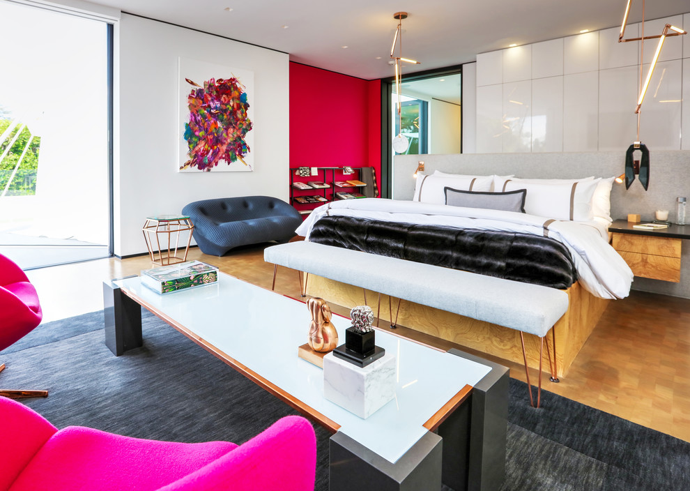 Contemporary master bedroom in Los Angeles with pink walls and no fireplace.