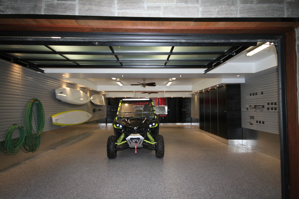 Photo of an expansive modern detached garage in Toronto.
