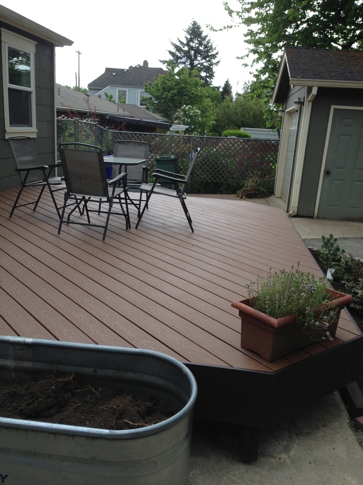 Photo of a traditional backyard deck in Portland with no cover.