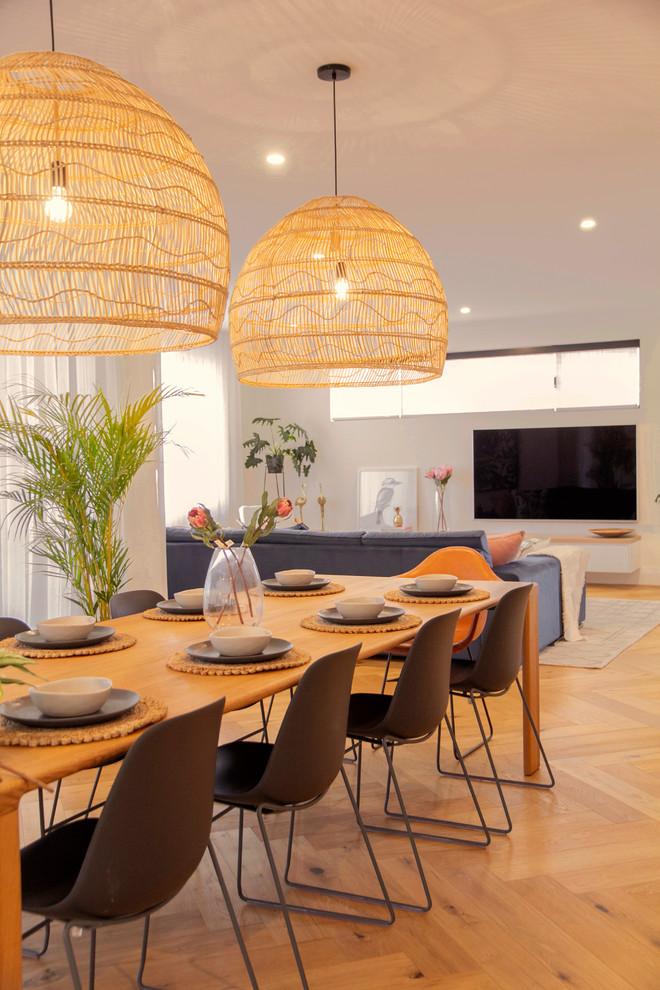 Design ideas for a tropical dining room in Perth.