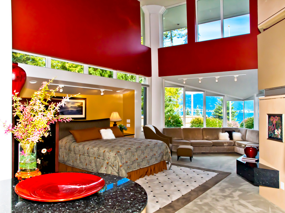 Design ideas for a large eclectic master bedroom in Seattle with red walls and carpet.