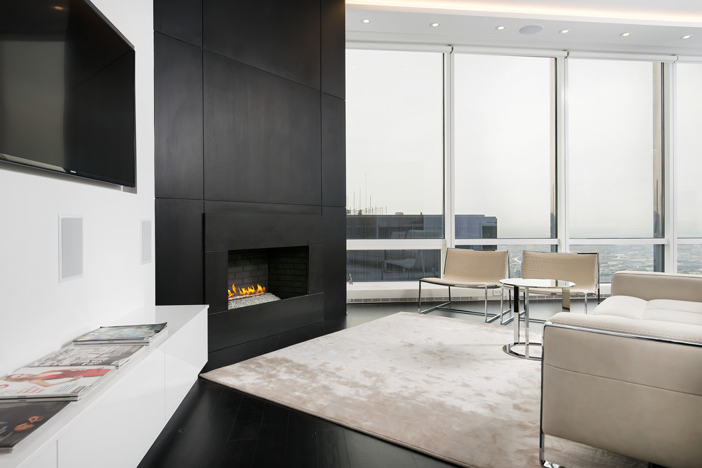 Inspiration for a small contemporary formal open concept living room in Chicago with white walls, dark hardwood floors, a corner fireplace and a wall-mounted tv.