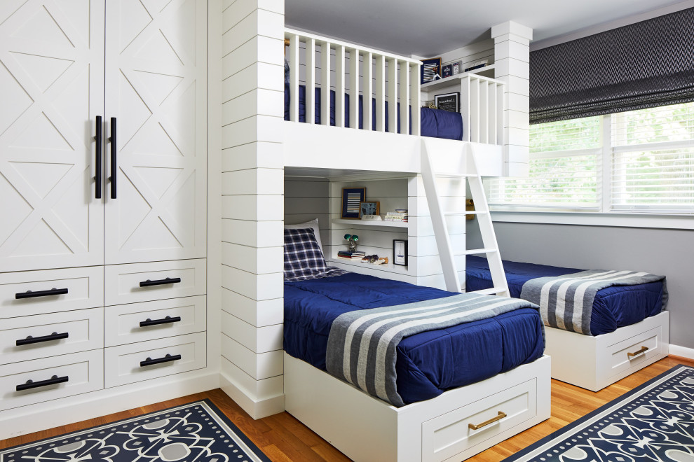 #mcleanrenovation - This room for three growing boys now gives each of them a private area of their own for sleeping, studying, and displaying their prized possessions.  By arranging the beds this way, we were also able to gain a second (much needed) closet/ wardrobe space.  Painting the floors gave the idea of a fun rug being there, but without shifting around and getting destroyed by the boys.