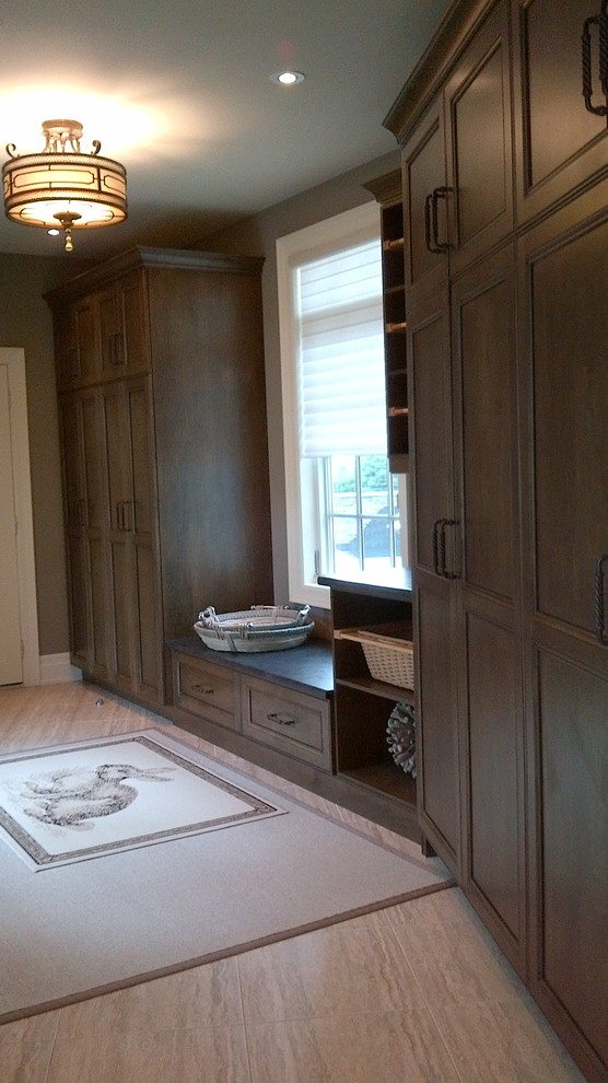 Example of a transitional home design design in Toronto